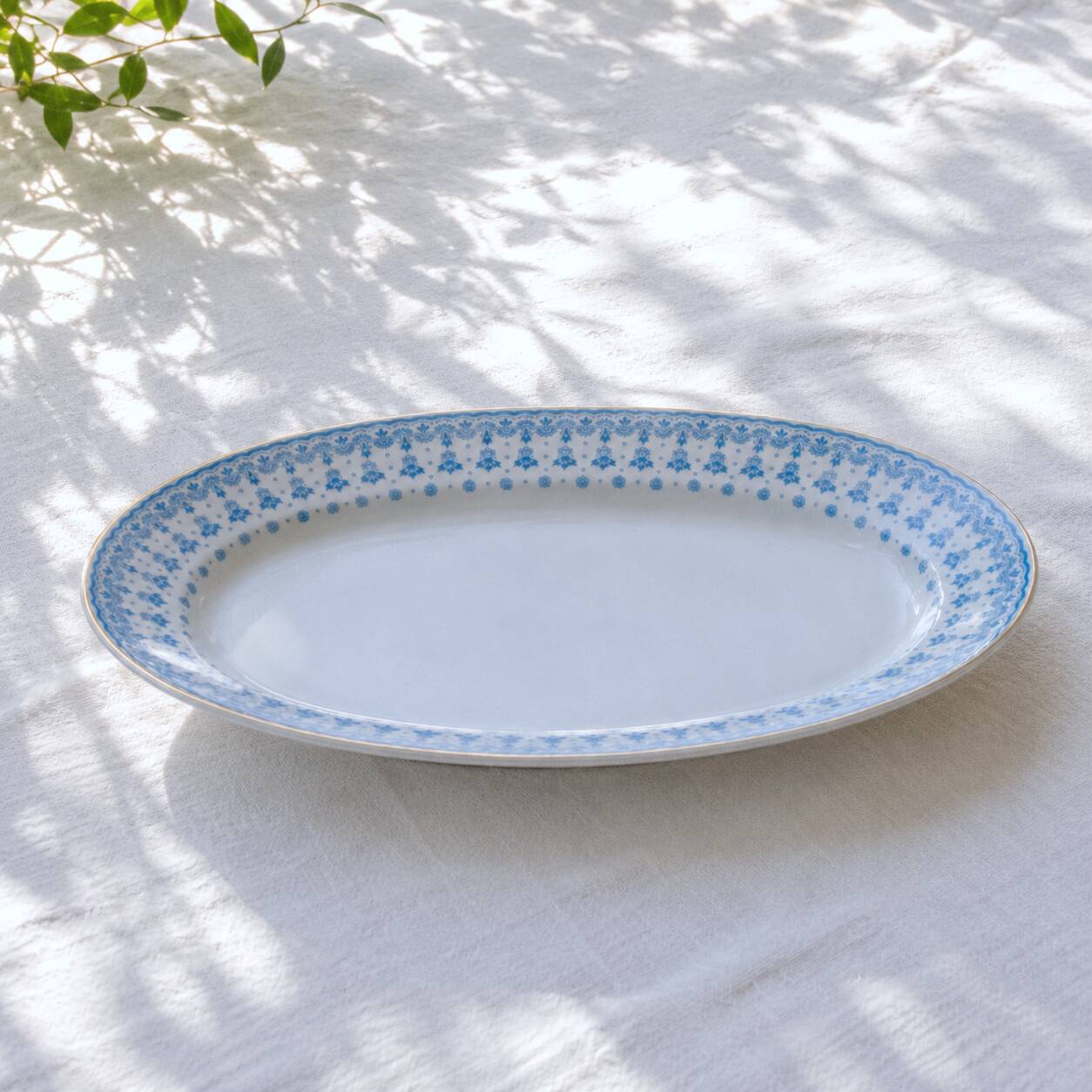 Grand plat ovale ancien de 1909 en porcelaine Oscar Schaller