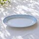 Grand plat ovale ancien de 1909 en porcelaine Oscar Schaller