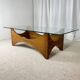 Sculptural coffee table in mahogany and glass – Europe, 1970s