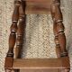 Wooden stool with a square seat