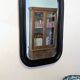 Miroir vintage noir aux angles arrondis