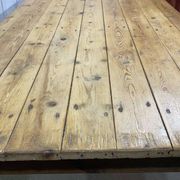 Early 20th-century farmhouse table made of fir, elm, and chestnut.
