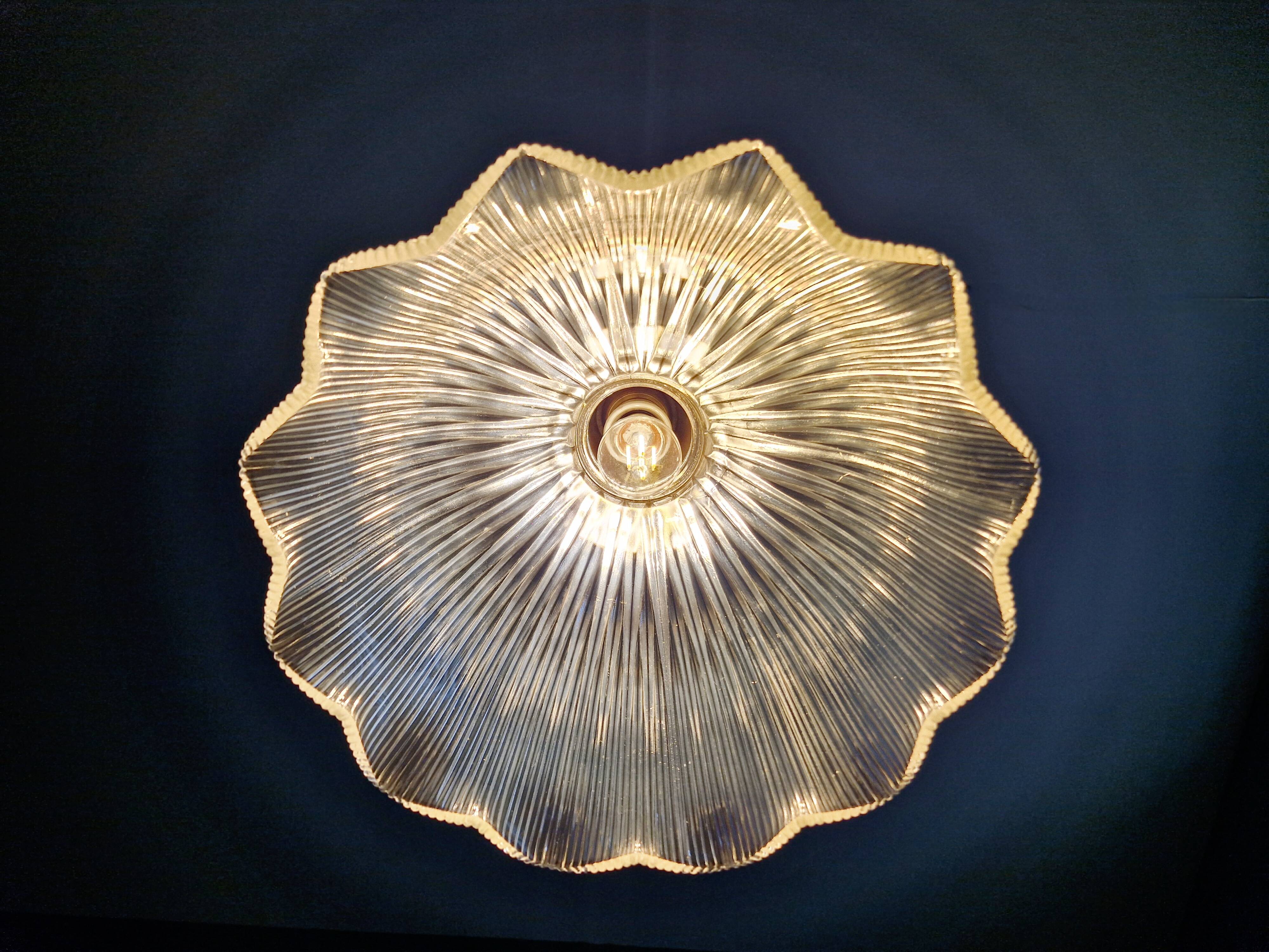 Large Holophane pendant light in transparent grooved glass