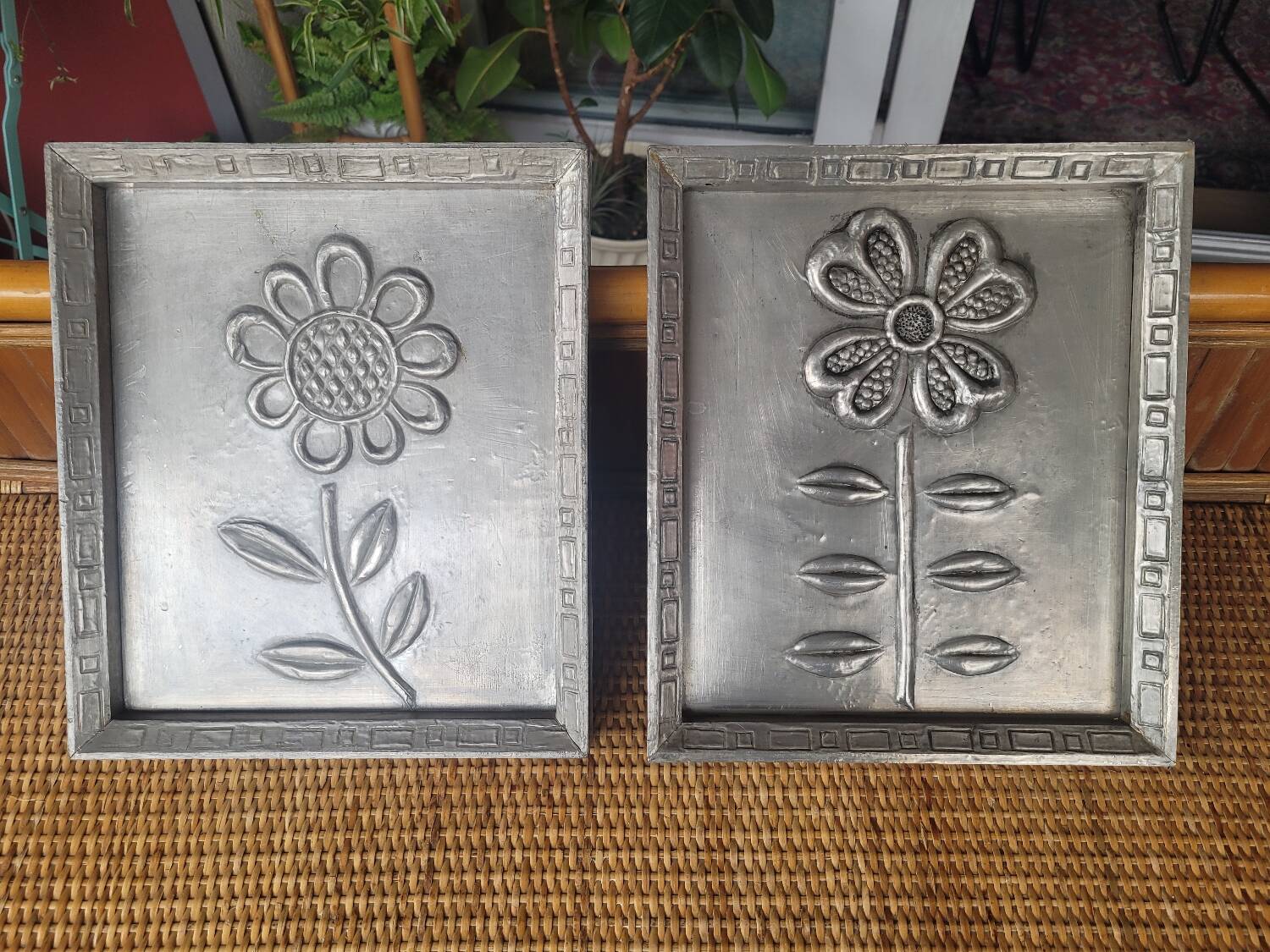 Pair of embossed flower paintings