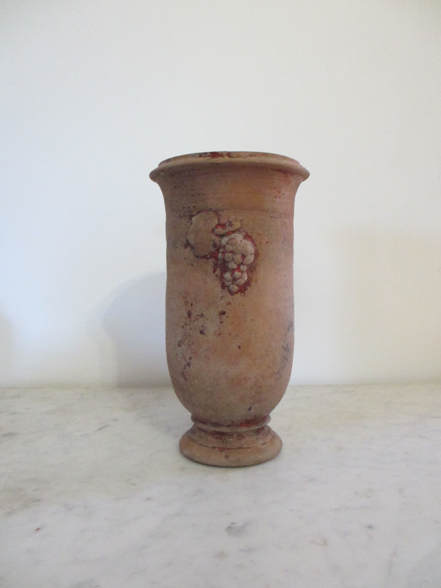 Terracotta vase . .