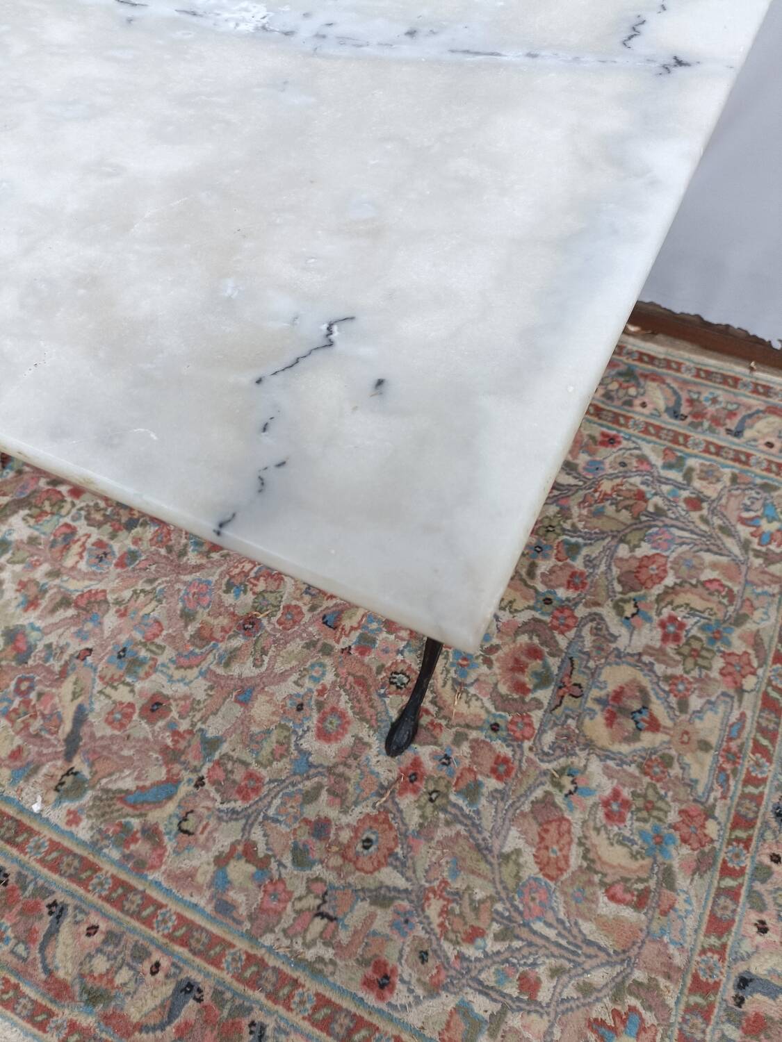 Bistro table with cast iron legs and marble top