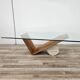 Valentino coffee table by Cattelan Italia in glass, wood, and travertine