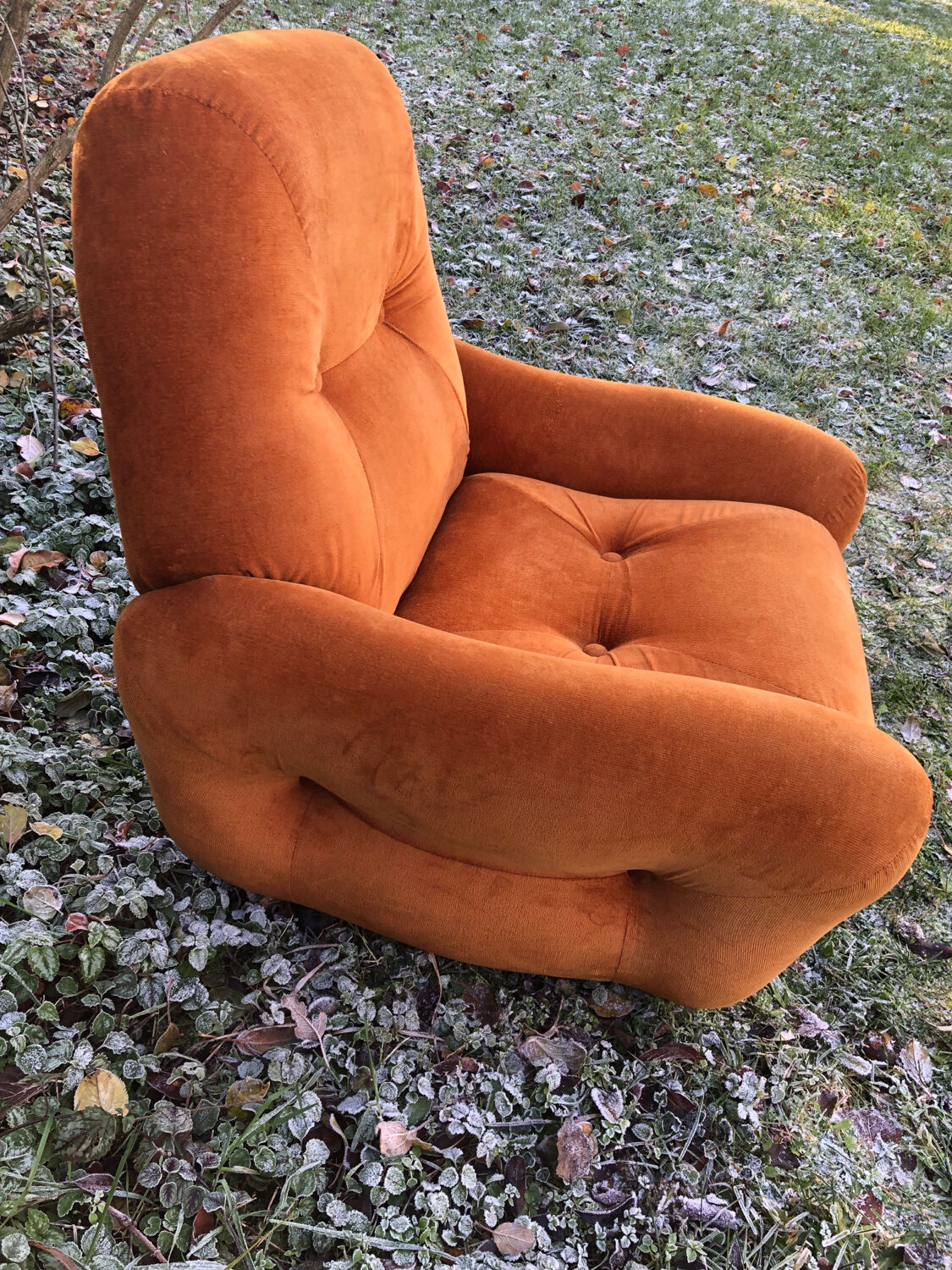 Orange velvet armchair