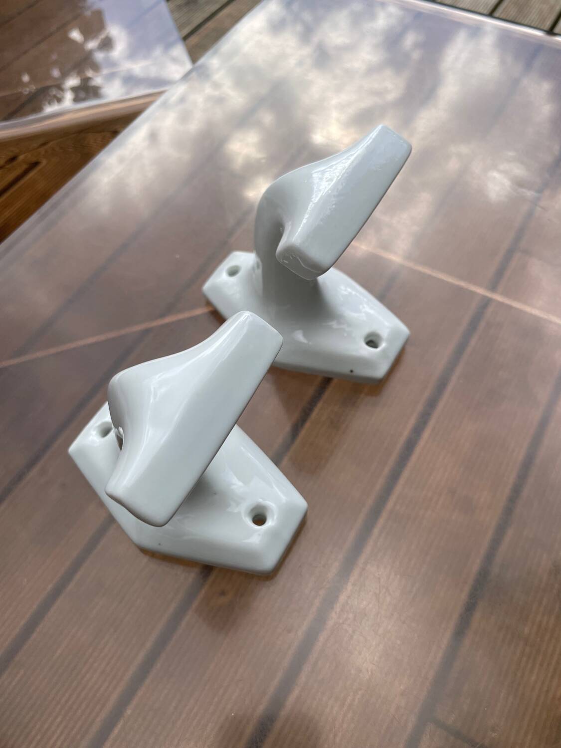 Duo of porcelain hooks