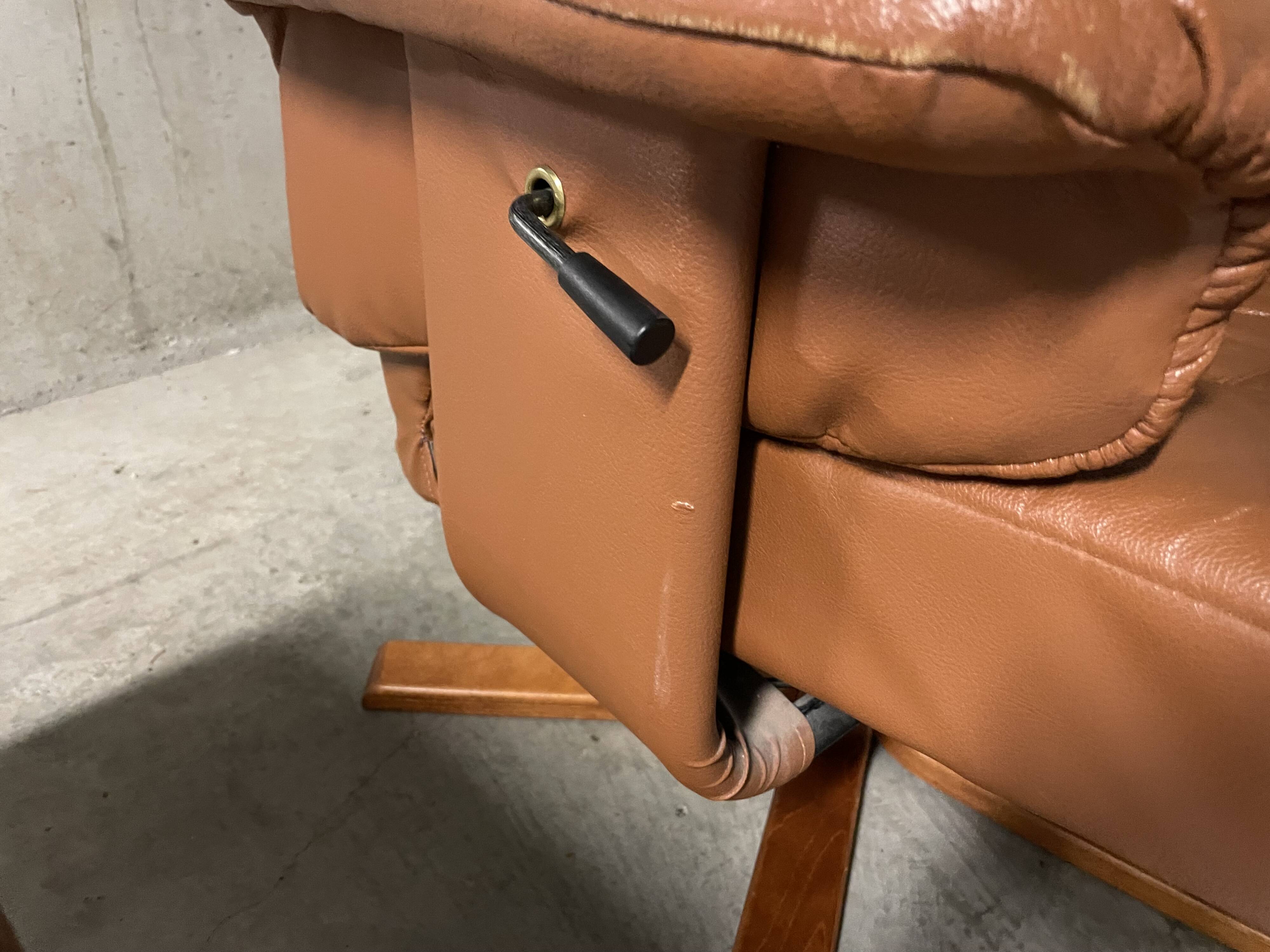 Unico leather armchair and ottoman