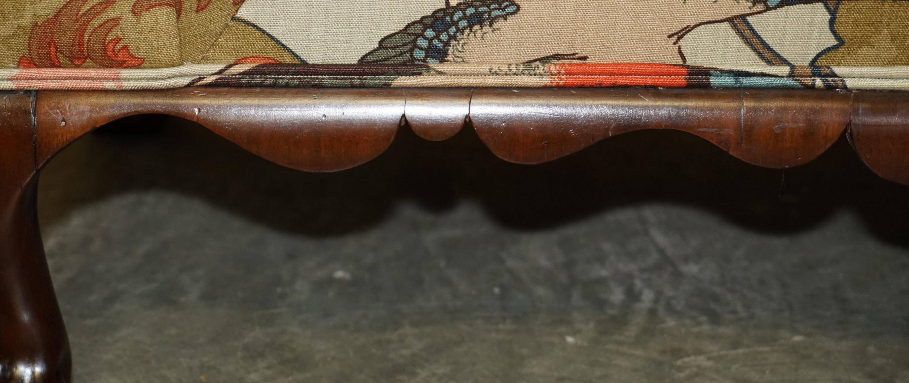 Antique banquette with cluster and ball feet, window seat in Mulberry Flying Ducks fabric.