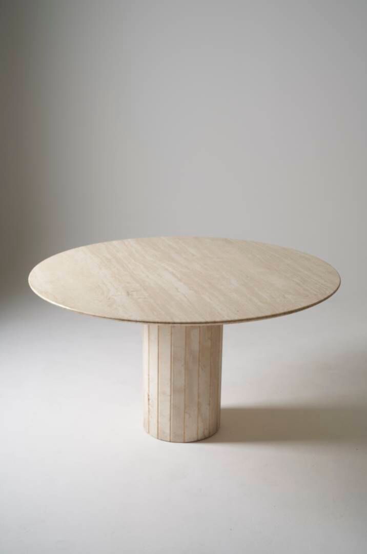 Round travertine dining table