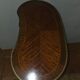 Kidney-shaped side table in Louis XVI style with marquetry.