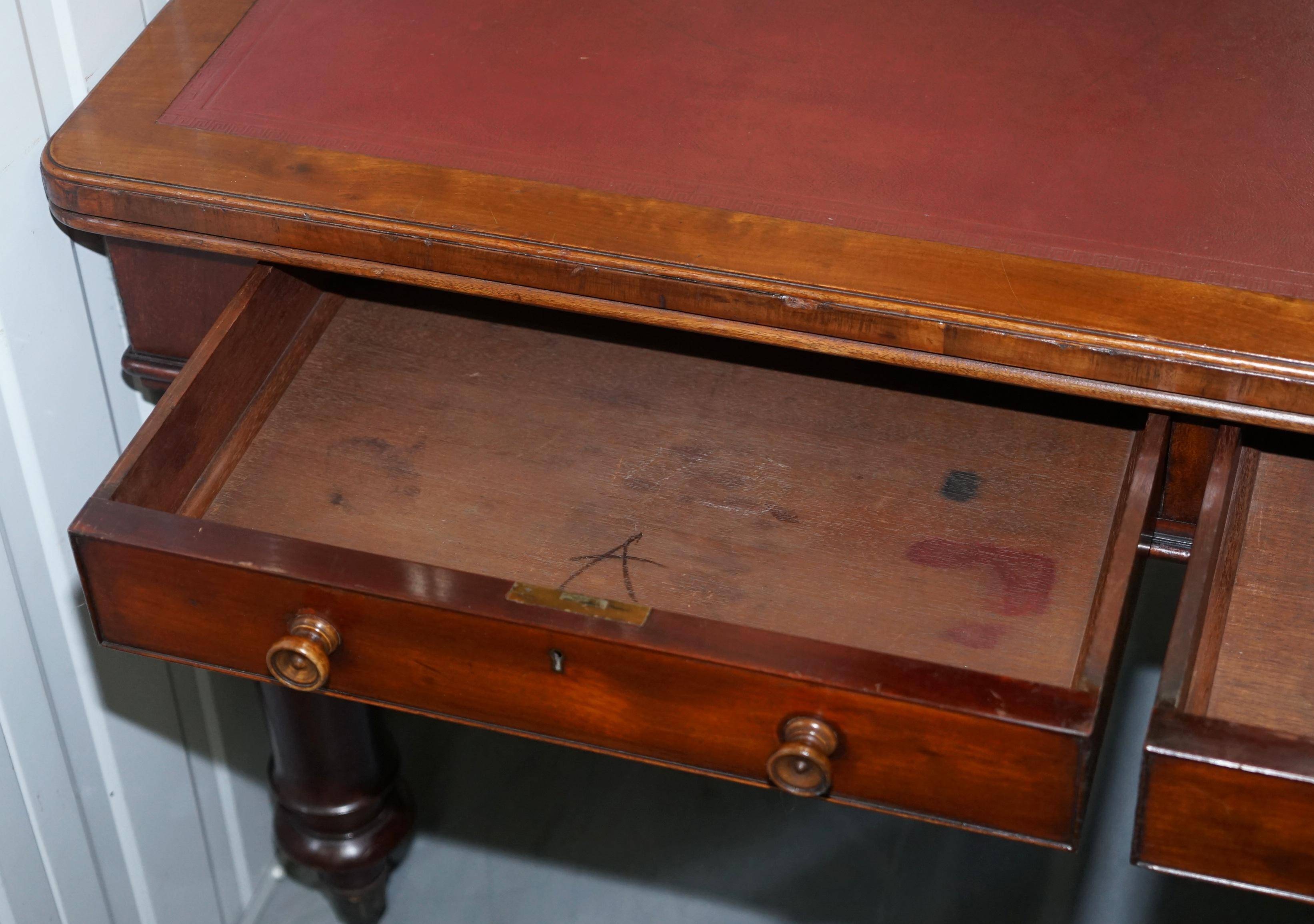 Rare double-sided desk in hardwood by Holland and Sons, Victorian era.