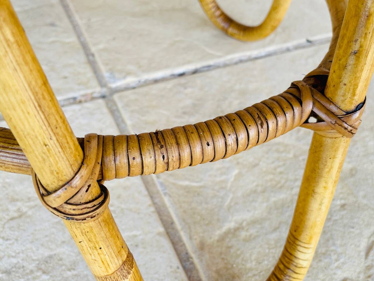 Vintage rattan and bamboo side table, circa 1969.