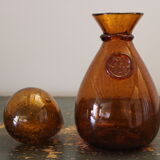 Biot decanter in blown glass bubbled orange hue