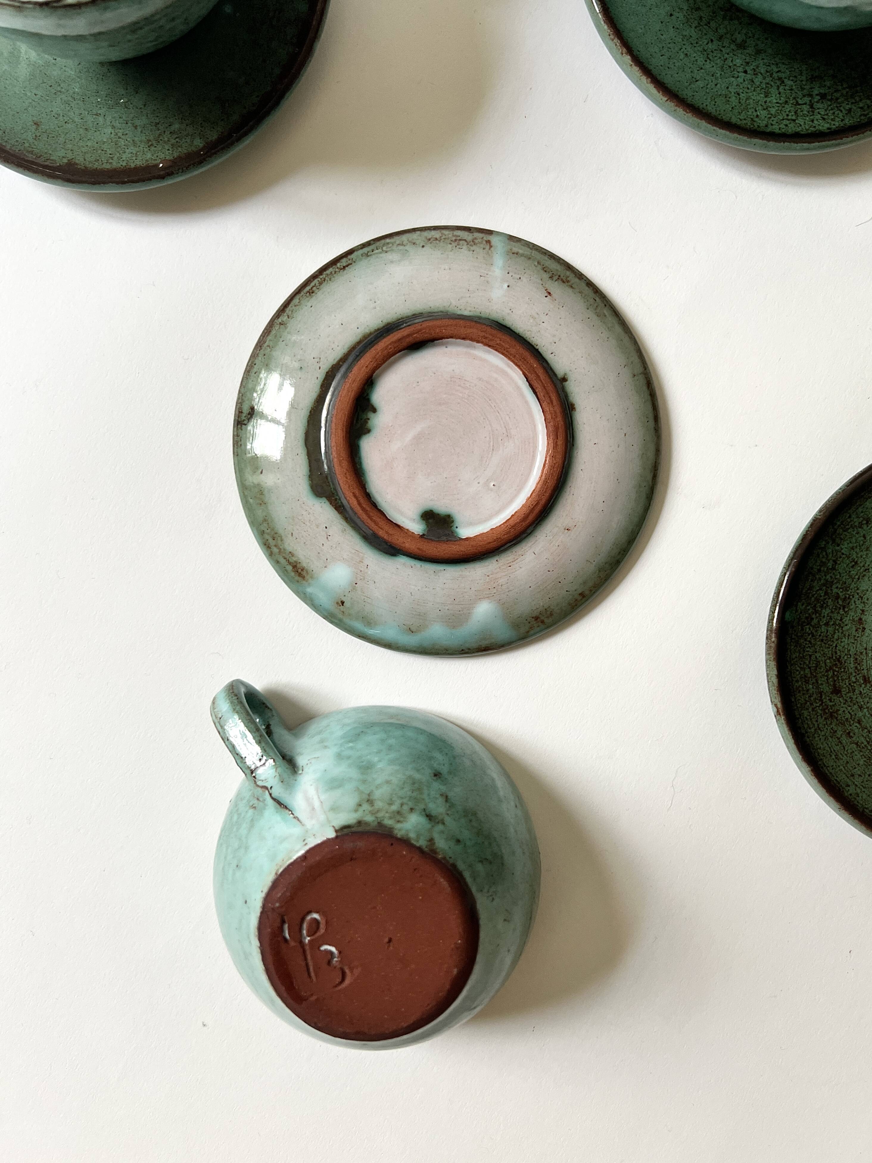 Handmade and signed glazed ceramic coffee cups, circa 1950.