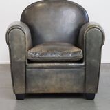 Sheepskin design armchair in a beautiful deep dark color
