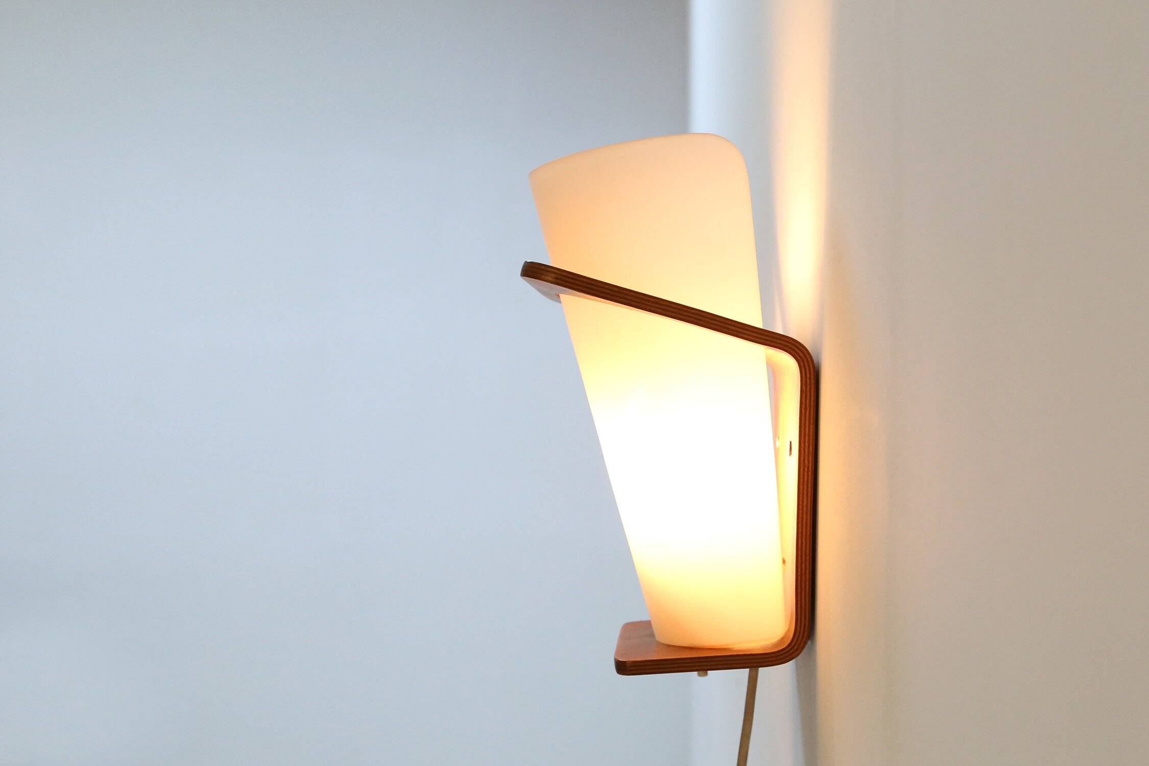 Wall Lamp in Curved Teak Plywood by Louis Kalff for Philips, 1959