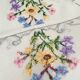 Delicate hand embroidered tablecloth with flowers, Romania
