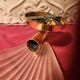 Pair of vintage brass wall lights with opaque glass shells
