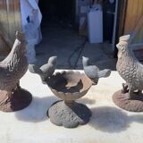 2 roosters and 2 cast iron birds