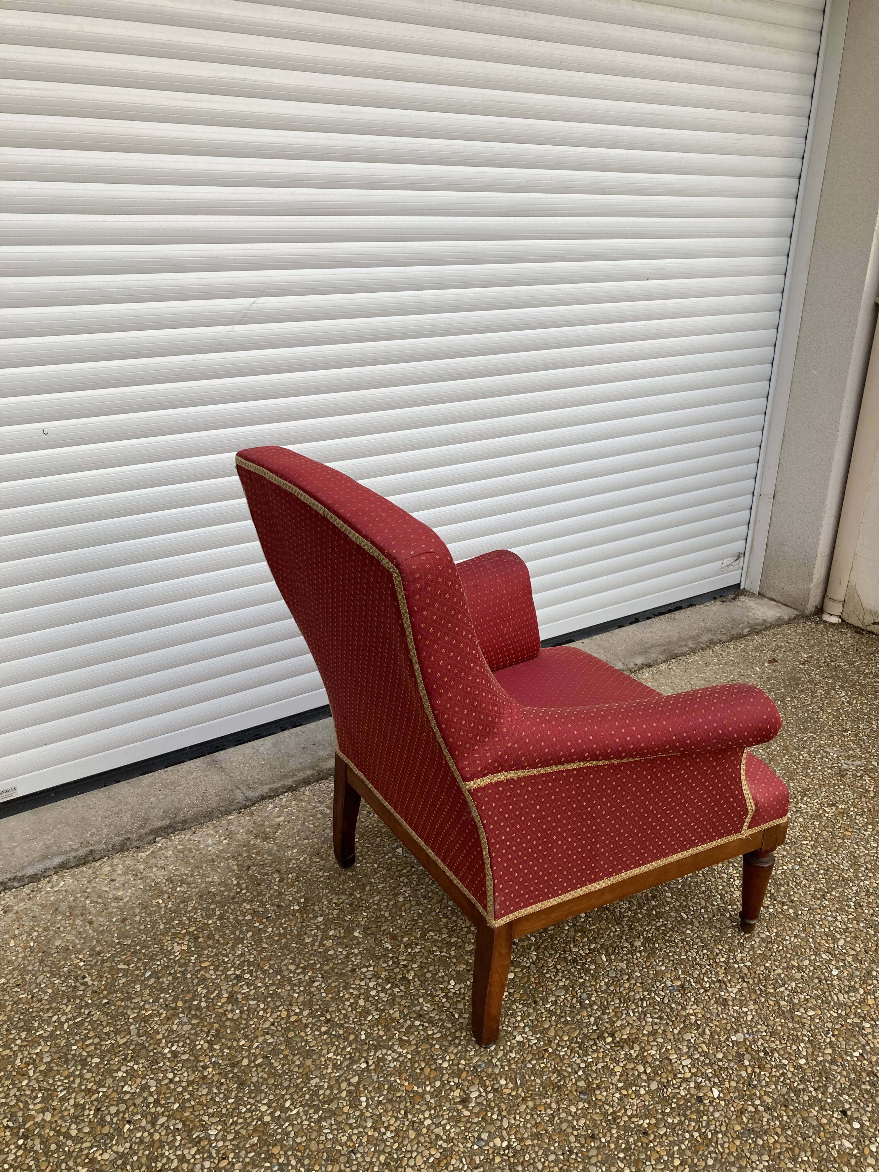 Antique upholstered armchair