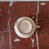 Three large stoneware cups with floral pattern, art deco