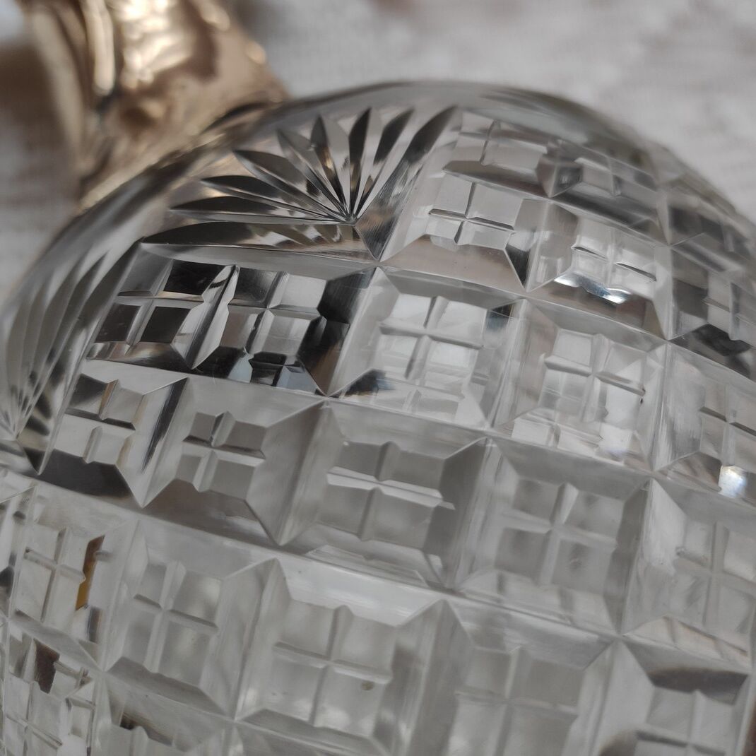 Cut crystal ewer and brass