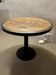 Antique bistro/atelier round table – wooden top with metal rim – foot