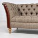 Chesterfield sofa in leather, fabric and wood