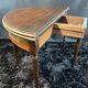 A Louis XVI period mahogany half-moon table forming a console/games table