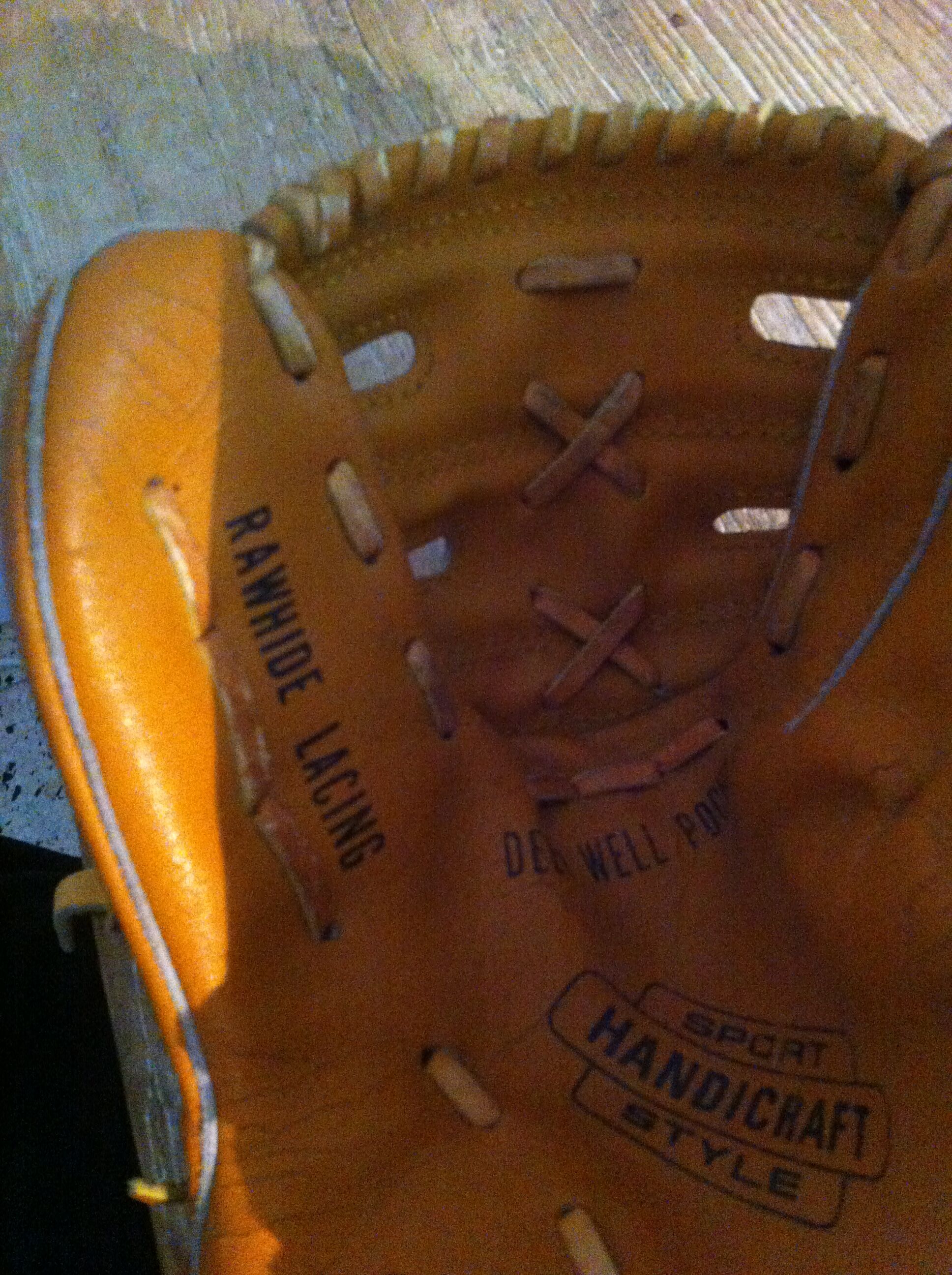 Vintage base ball glove with vintage softball