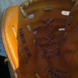Vintage base ball glove with vintage softball