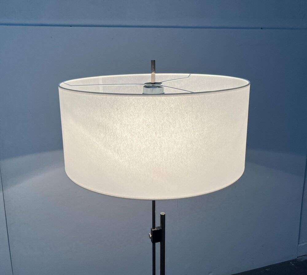 Mid-century German minimalist tripod floor lamp from the 1960s.