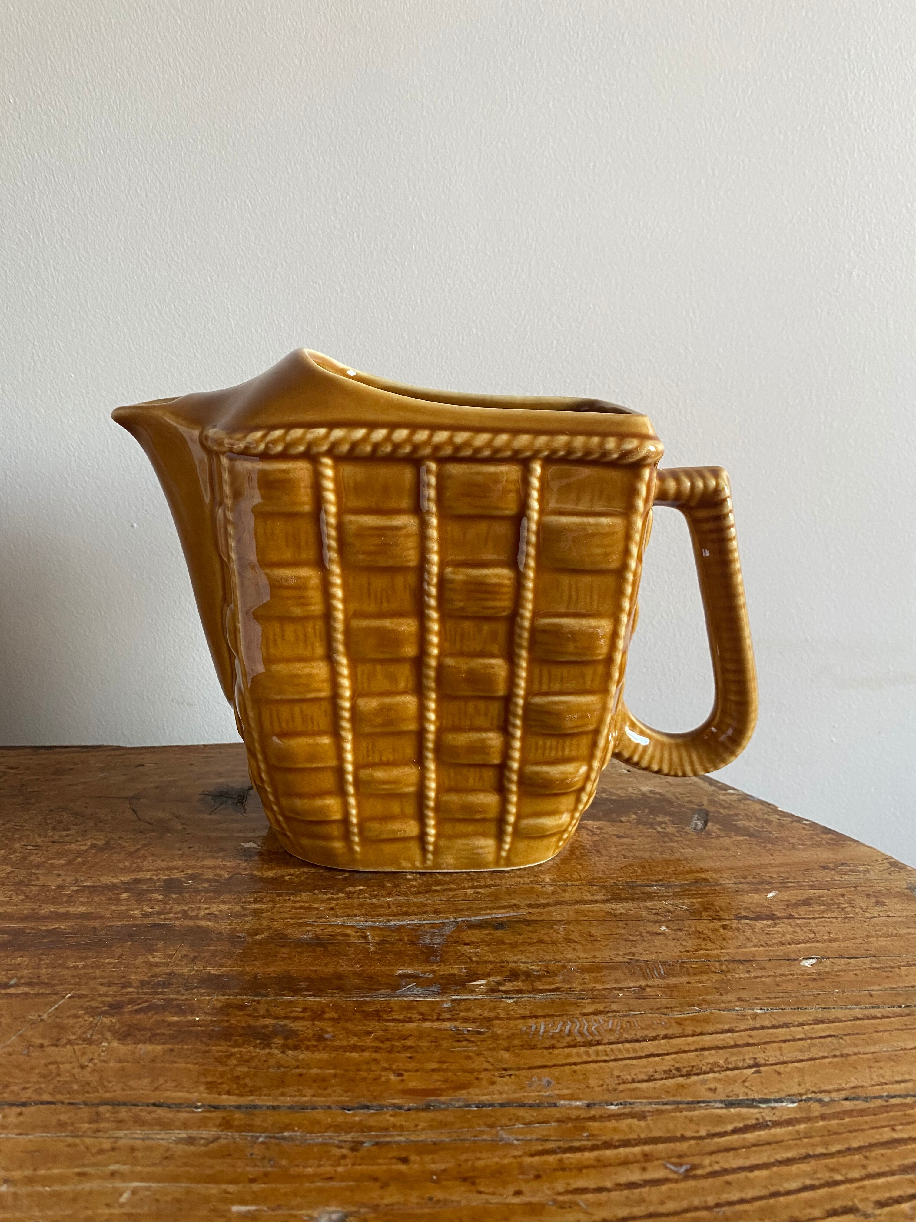Glazed ceramic water pitcher