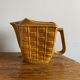 Glazed ceramic water pitcher