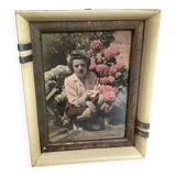 Old photograph of a woman with hydrangeas