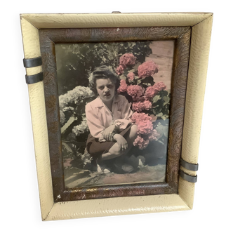 Old photograph of a woman with hydrangeas