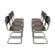 Ensemble de six chaises industrielles en contreplaqué Gispen dans un cadre gris et wengé.