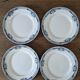 4 Lily Longchamp dinner plates