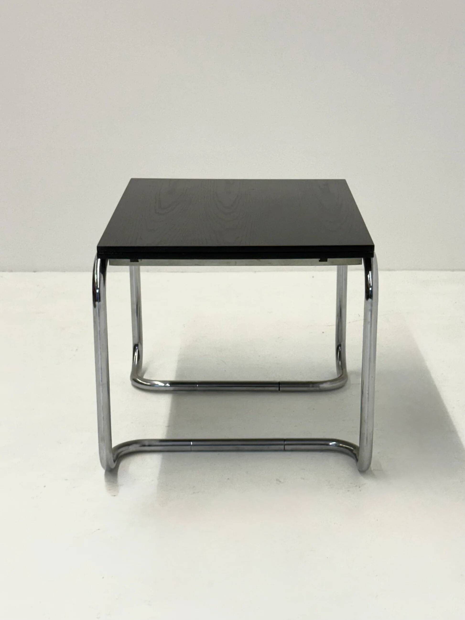 Acerbis dining table with black oak top by Giotto Stoppino