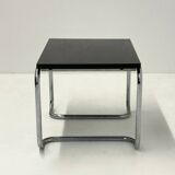Acerbis dining table with black oak top by Giotto Stoppino