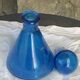 Blue bottle, glass vial for vintage perfume or liqueur.