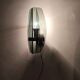 Smoked glass wall sconce. Italy, 1970s.