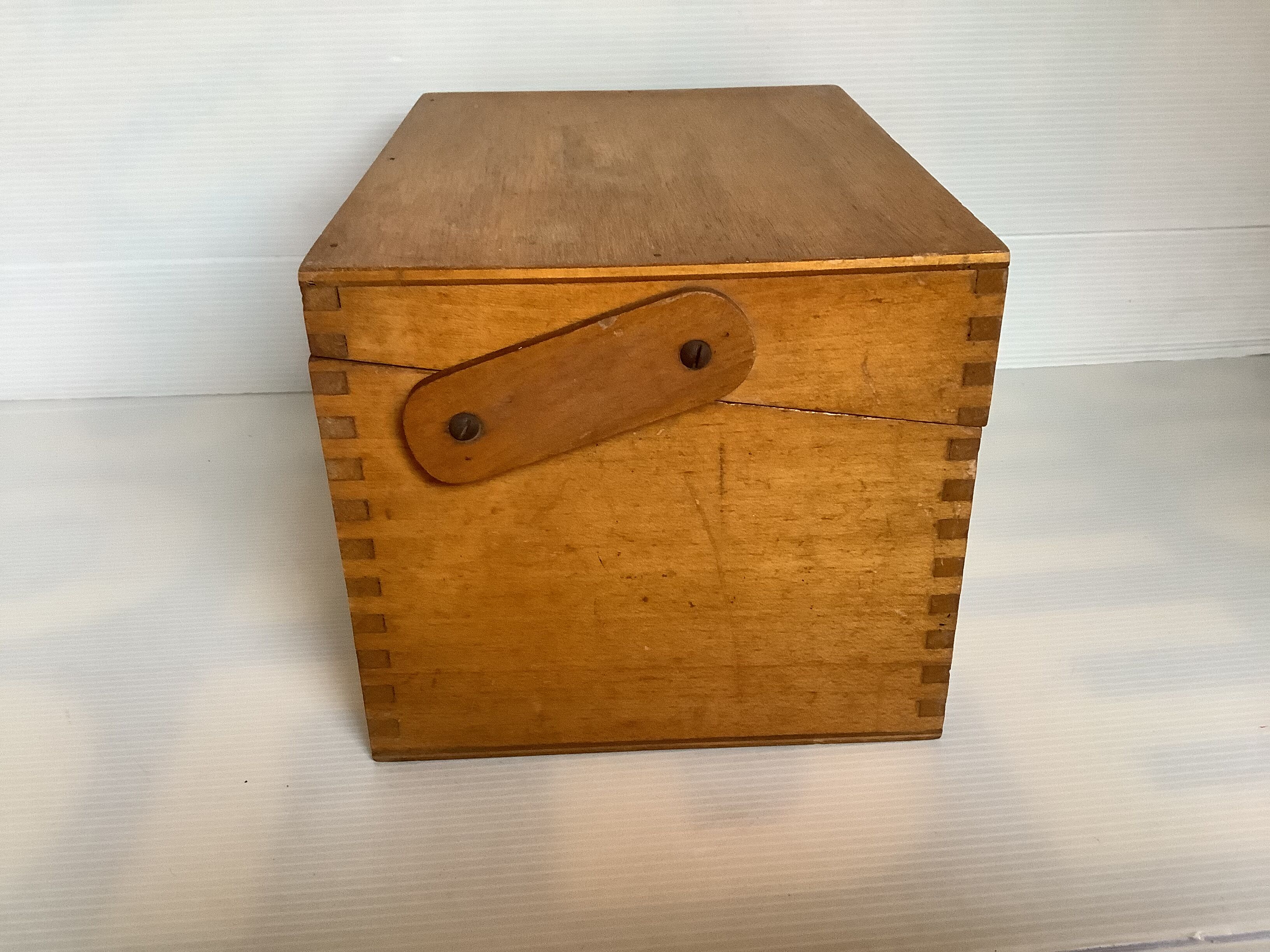 Wooden storage box dovetail mounting
