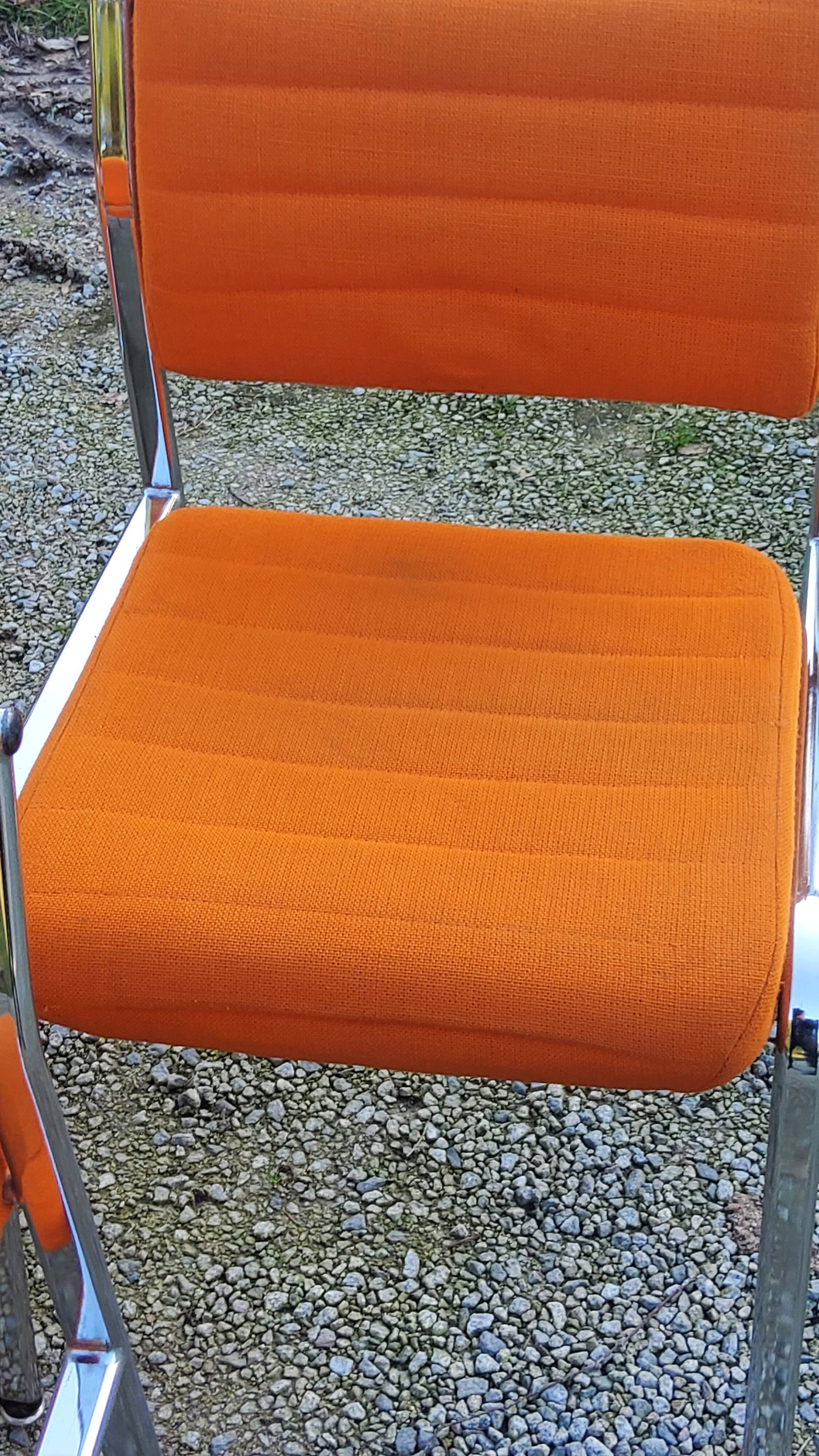 Set of 6 designer chairs from the 70s orange fabrics and chrome tubes