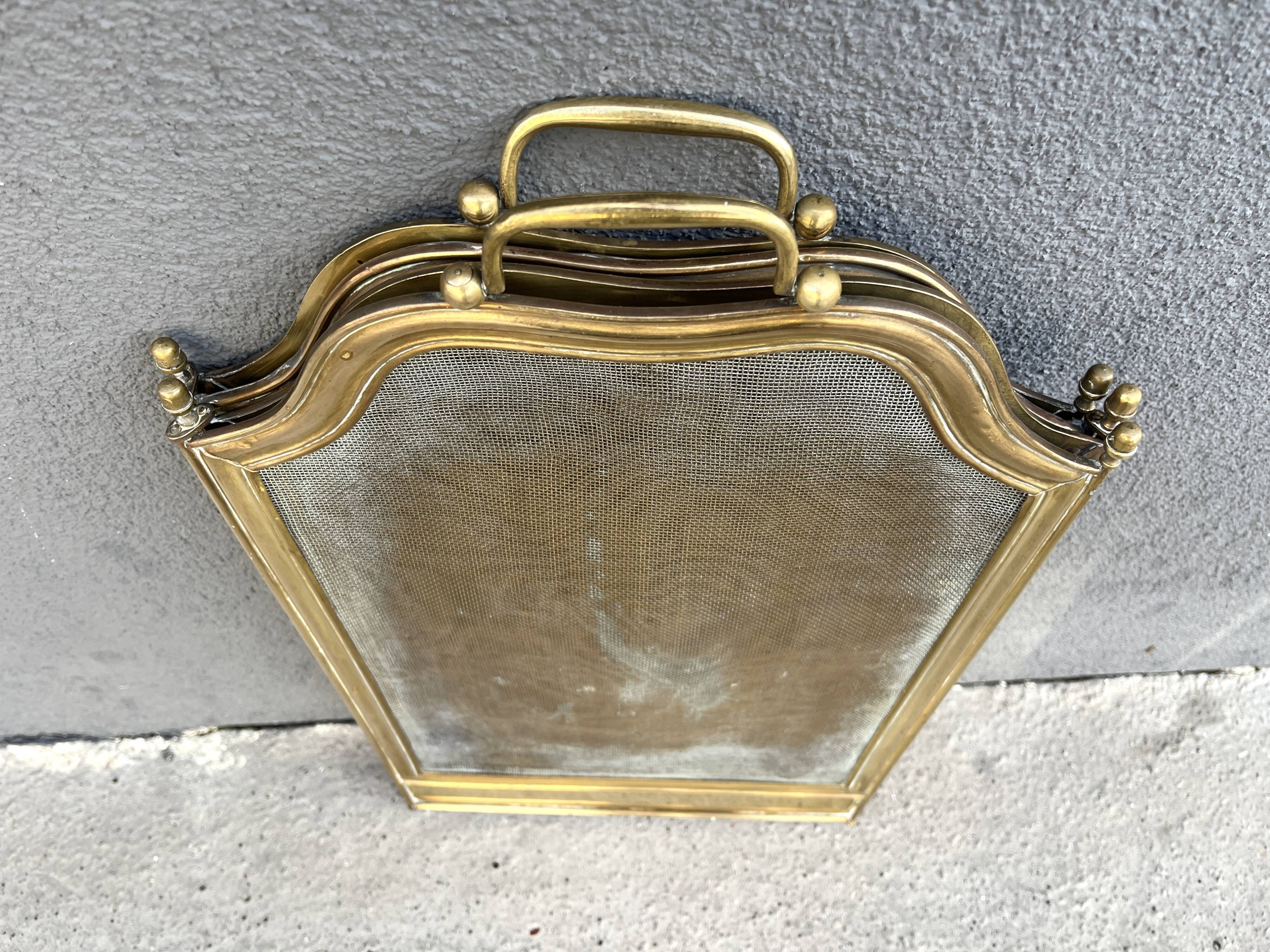 19th-century fireplace screen by Bouhon Frères in brass