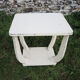 Old white wooden peestal table in art deco style