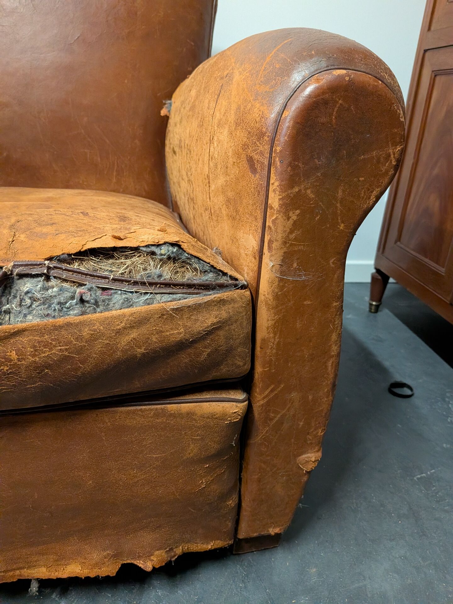 Pair of moustache club armchairs in leather, France, 1930s — to be restored.
